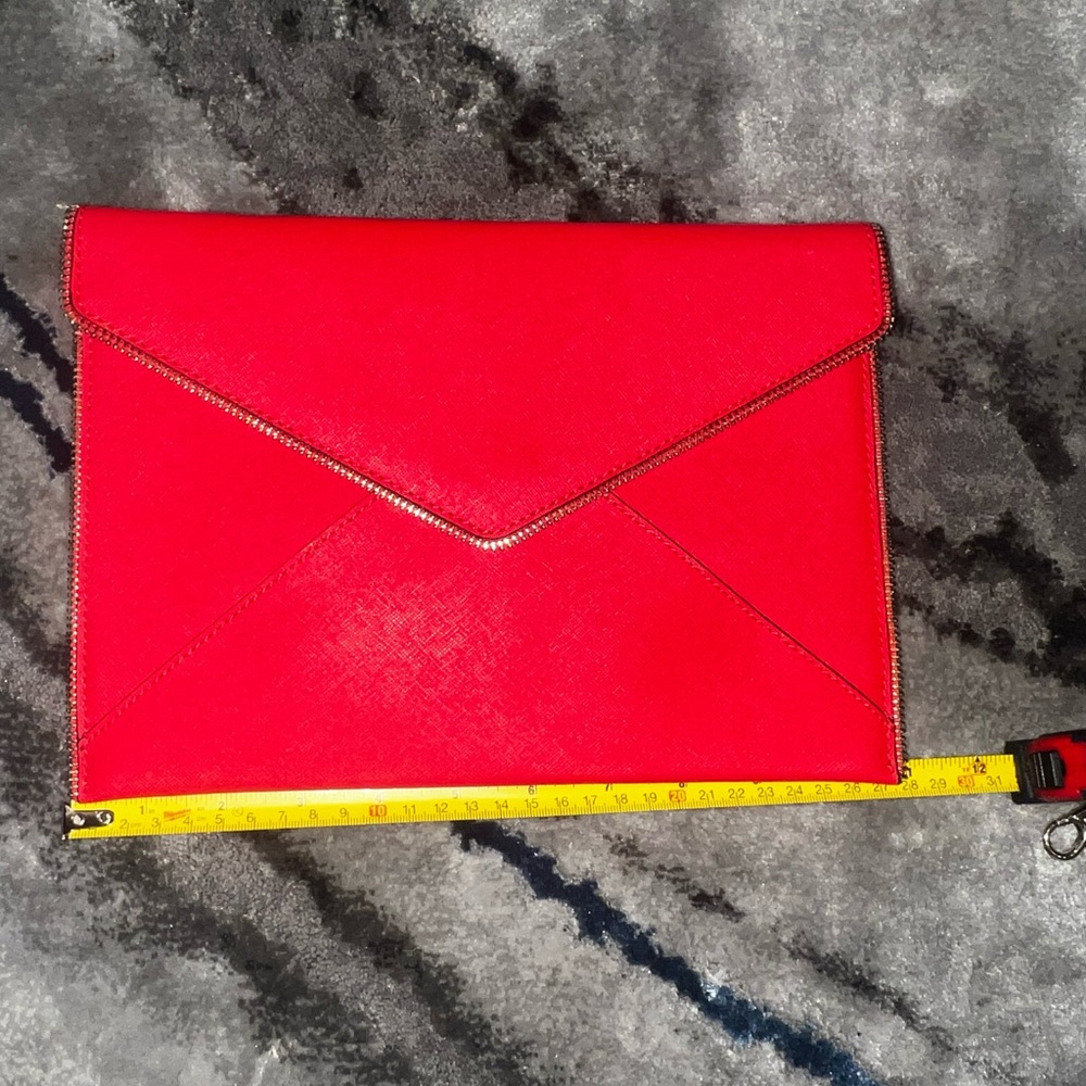 Brand new. Clutch 7X11